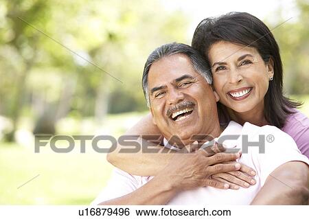 Stock Photograph - Portrait Of Senior Couple In Park. Fotosearch