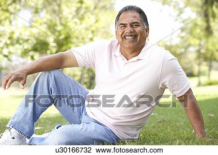 Stock Image - Portrait Of Senior Man In Park. Fotosearch