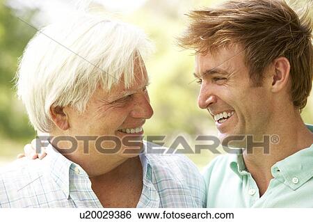 Portrait Of Senior Man Talking To Adult Son View Large Photo Image Stock Photograph - Portrait Of Senior Man Talking To Adult Son. Fotosearch