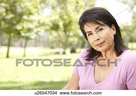 Picture - Portrait Of Senior Woman In Park. Fotosearch