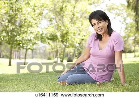 Portrait Of Senior Woman In Park View Large Photo Image Stock Photo - Portrait Of Senior Woman In Park. Fotosearch