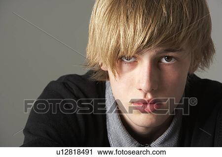 Portrait Of Serious Teenage Boy View Large Photo Image Stock Image - Portrait Of Serious Teenage Boy. Fotosearch