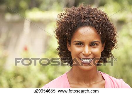 Portrait Of Smiling Young Woman View Large Photo Image Stock Photography - Portrait Of Smiling Young Woman. Fotosearch