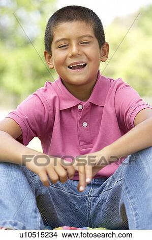 Portrait Of Young Boy In Park View Large Photo Image Picture - Portrait Of Young Boy In Park. Fotosearch