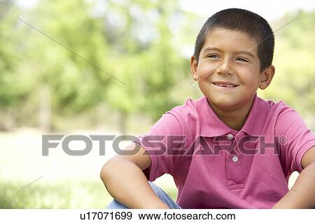 Portrait Of Young Boy In Park View Large Photo Image Stock Photo - Portrait Of Young Boy In Park. Fotosearch