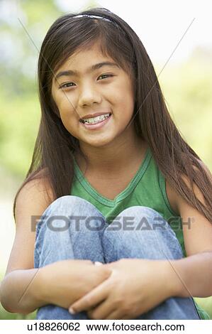 Portrait Of Young Girl In Park View Large Photo Image Stock Image - Portrait Of Young Girl In Park. Fotosearch