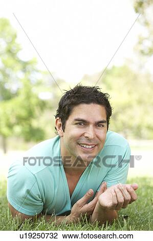 Portrait Of Young Man In Park View Large Photo Image Stock Image - Portrait Of Young Man In Park. Fotosearch