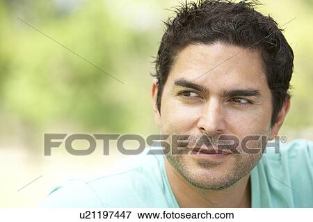 Portrait Of Young Man In Park View Large Photo Image Stock Photo - Portrait Of Young Man In Park. Fotosearch