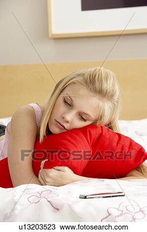 Sad Teenage Girl In Bedroom With Mobile Phone View Large Photo Image Stock Image - Sad Teenage Girl In Bedroom With Mobile Phone. Fotosearch