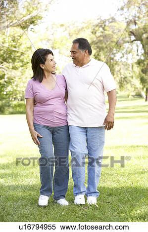 Senior Couple Walking In Park View Large Photo Image Stock Photography - Senior Couple Walking In Park. Fotosearch