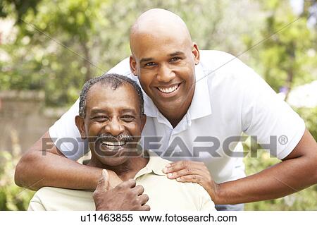 Senior Man Hugging Adult Son View Large Photo Image Stock Photography - Senior Man Hugging Adult Son. Fotosearch