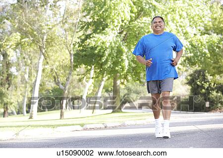Senior Man Jogging In Park View Large Photo Image Stock Image - Senior Man Jogging In Park. Fotosearch