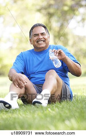 Senior Man Relaxing After Exercise View Large Photo Image Stock Image - Senior Man Relaxing After Exercise. Fotosearch