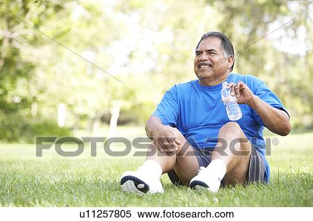 Senior Man Relaxing After Exercise View Large Photo Image Stock Photography - Senior Man Relaxing After Exercise. Fotosearch