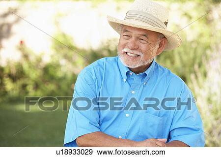 Senior Man Relaxing In Garden View Large Photo Image Stock Photo - Senior Man Relaxing In Garden. Fotosearch