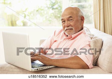 Senior Man Using Laptop At Home View Large Photo Image Stock Image - Senior Man Using Laptop At Home. Fotosearch