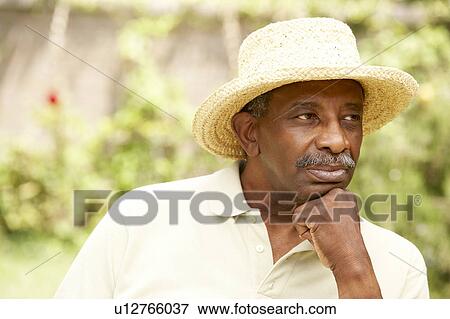 Stock Photo - Senior Man With Thoughtful Expression. Fotosearch