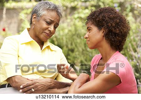 Senior Woman Being Consoled By Adult Daughter View Large Photo Image Picture - Senior Woman Being Consoled By Adult Daughter. Fotosearch