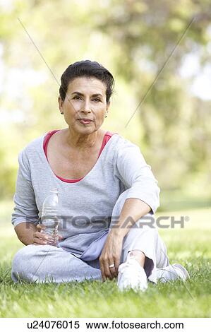 Stock Photography - Senior Woman Resting After Exercise. Fotosearch