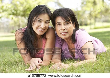 Senior Woman With Adult Daughter In Park View Large Photo Image Stock Image - Senior Woman With Adult Daughter In Park. Fotosearch