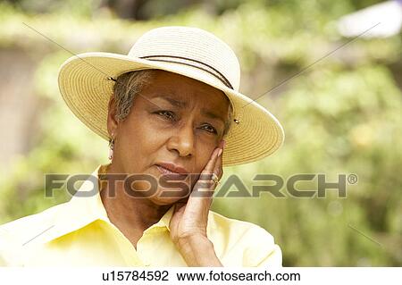 Senior Woman With Thoughtful Expression View Large Photo Image Stock Image - Senior Woman With Thoughtful Expression. Fotosearch