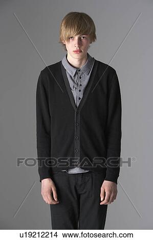 Picture - Studio Portrait Of Fashionably Dressed Teenage Boy. Fotosearch