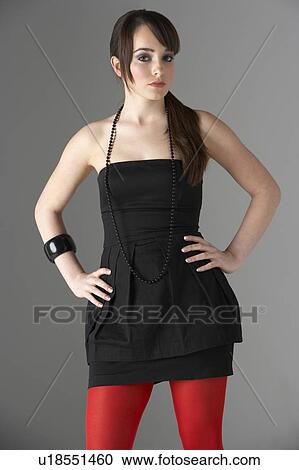 Studio Portrait Of Fashionably Dressed Teenage Girl View Large Photo Image Stock Image - Studio Portrait Of Fashionably Dressed Teenage Girl. Fotosearch