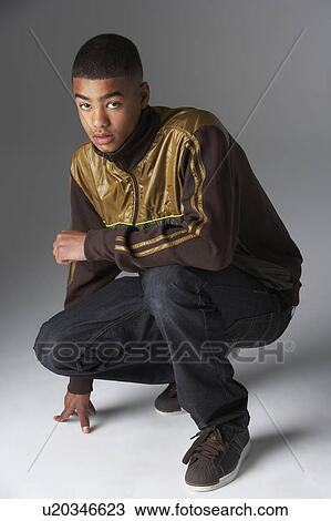Studio Portrait Of Fashionably Dressed Teenage Boy View Large Photo Image Stock Image - Studio Portrait Of Fashionably Dressed Teenage Boy. Fotosearch