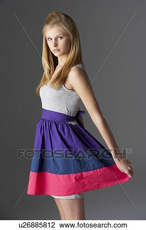 Studio Portrait Of Fashionably Dressed Teenage Girl View Large Photo Image Stock Image - Studio Portrait Of Fashionably Dressed Teenage Girl. Fotosearch