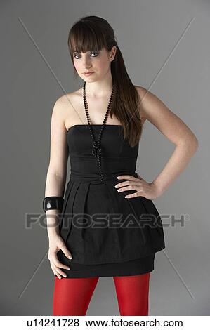 Studio Portrait Of Fashionably Dressed Teenage Girl View Large Photo Image Stock Photo - Studio Portrait Of Fashionably Dressed Teenage Girl. Fotosearch