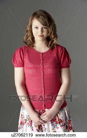 Stock Photo - Studio Portrait Of Fashionably Dressed Teenage Girl. Fotosearch