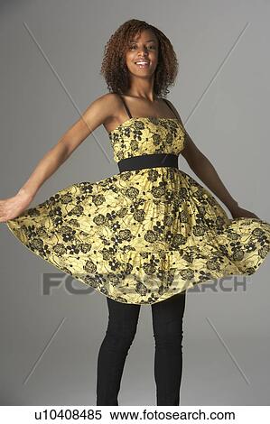 Studio Portrait Of Fashionably Dressed Teenage Girl View Large Photo Image Stock Photography - Studio Portrait Of Fashionably Dressed Teenage Girl. Fotosearch
