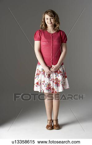 Studio Portrait Of Fashionably Dressed Teenage Girl View Large Photo Image Stock Photography - Studio Portrait Of Fashionably Dressed Teenage Girl. Fotosearch