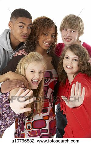 Stock Image - Studio Portrait Of Five Teenage Friends. Fotosearch