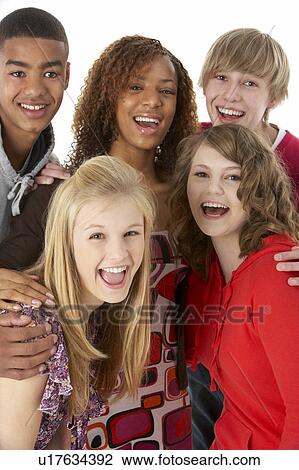 Stock Image - Studio Portrait Of Five Teenage Friends. Fotosearch