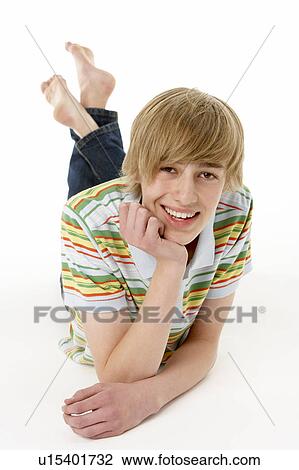 Studio Portrait Of Happy Teenage Boy View Large Photo Image Stock Image - Studio Portrait Of Happy Teenage Boy. Fotosearch
