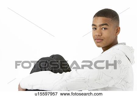 Studio Portrait Of Serious Teenage Boy View Large Photo Image Stock Photo - Studio Portrait Of Serious Teenage Boy. Fotosearch
