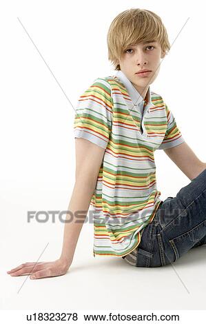 Studio Portrait Of Serious Teenage Boy View Large Photo Image Stock Photo - Studio Portrait Of Serious Teenage Boy. Fotosearch