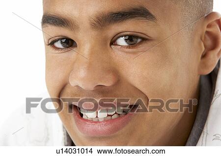 Studio Portrait Of Smiling Teenage Boy View Large Photo Image Picture - Studio Portrait Of Smiling Teenage Boy. Fotosearch