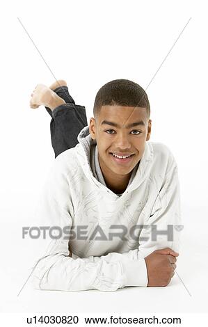 Studio Portrait Of Smiling Teenage Boy View Large Photo Image Stock Image - Studio Portrait Of Smiling Teenage Boy. Fotosearch