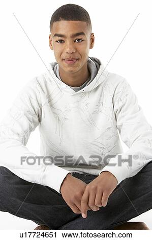 Studio Portrait Of Smiling Teenage Boy View Large Photo Image Stock Image - Studio Portrait Of Smiling Teenage Boy. Fotosearch