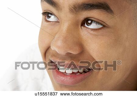 Studio Portrait Of Smiling Teenage Boy View Large Photo Image Stock Photo - Studio Portrait Of Smiling Teenage Boy. Fotosearch