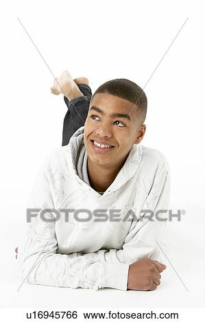 Studio Portrait Of Smiling Teenage Boy View Large Photo Image Stock Photograph - Studio Portrait Of Smiling Teenage Boy. Fotosearch