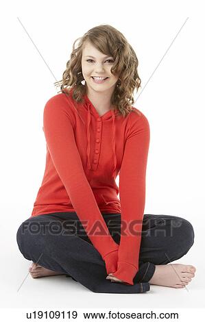 Studio Portrait Of Smiling Teenage Girl View Large Photo Image Stock Photo - Studio Portrait Of Smiling Teenage Girl. Fotosearch