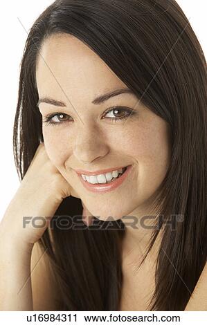Stock Image - Studio Portrait Of Smiling Woman. Fotosearch
