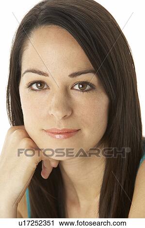 Stock Image - Studio Portrait Of Smiling Woman. Fotosearch