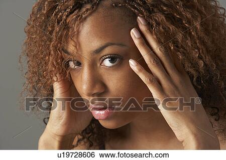 Studio Portrait Of Stressed Teenage Girl View Large Photo Image Stock Photograph - Studio Portrait Of Stressed Teenage Girl. Fotosearch