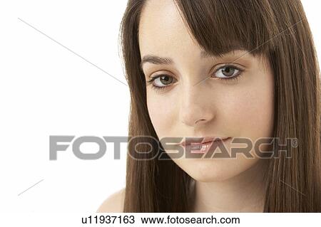 Stock Image - Studio Portrait Of Teenage Girl On White Background. Fotosearch