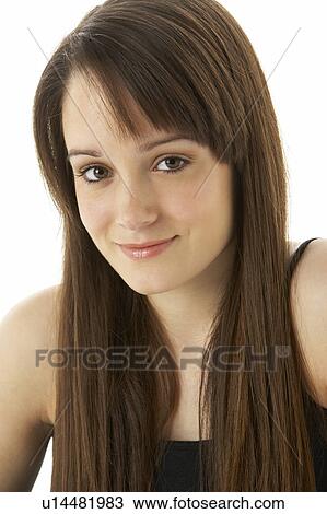Stock Image - Studio Portrait Of Teenage Girl On White Background. Fotosearch