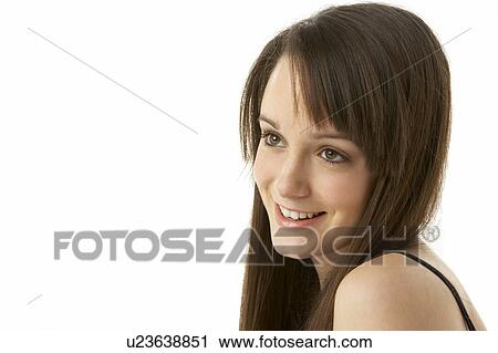 Stock Image - Studio Portrait Of Teenage Girl On White Background. Fotosearch